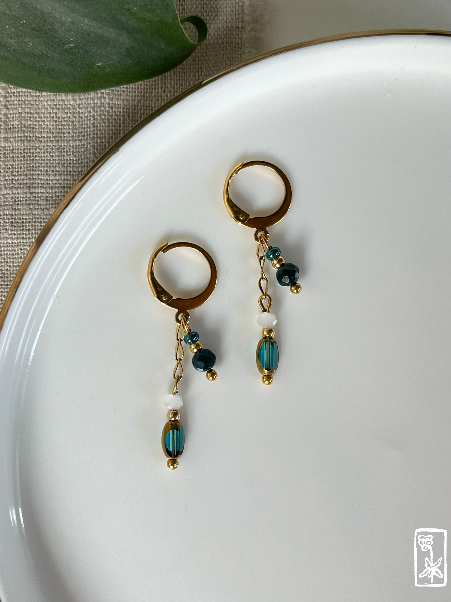 Ohrringe mit türkisen Glasperlen